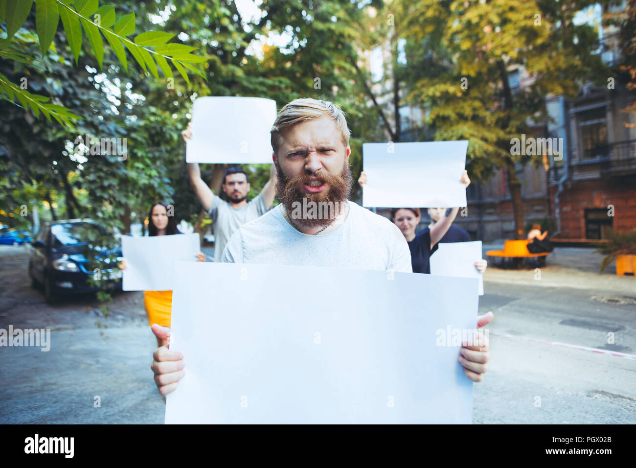 Angry man holding empty protest hi-res stock photography and images - Alamy