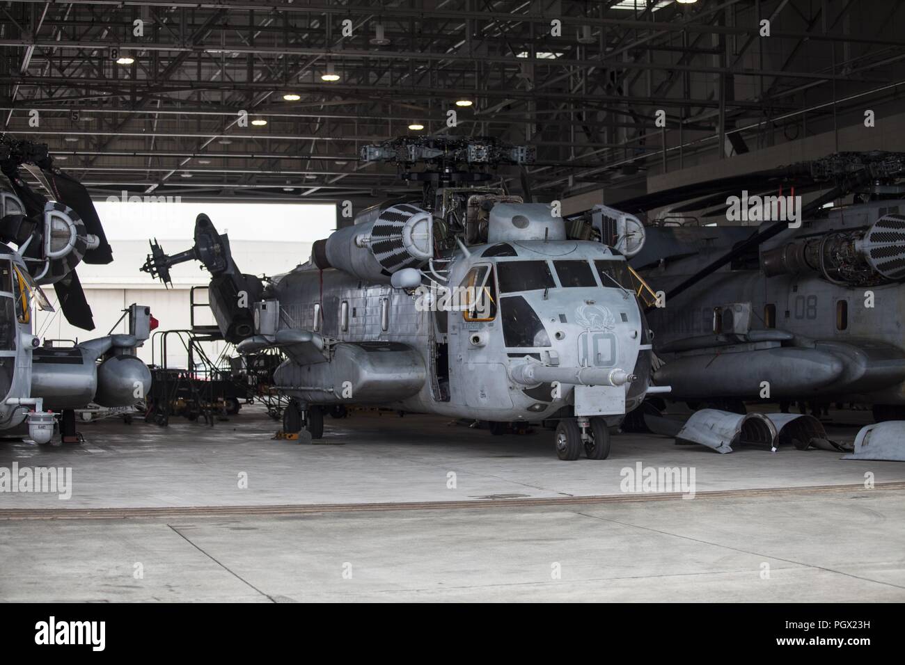 Secured CH-53E Super Stallion helicopters prepared for the Hurricane Lane's arrival at Marine Corps Air Station (MCAS) Kaneohe Bay, Hawaii, August 22, 2018. Image courtesy Sgt. Jesus Sepulveda Torres / Marine Corps Base Hawaii. () Stock Photo