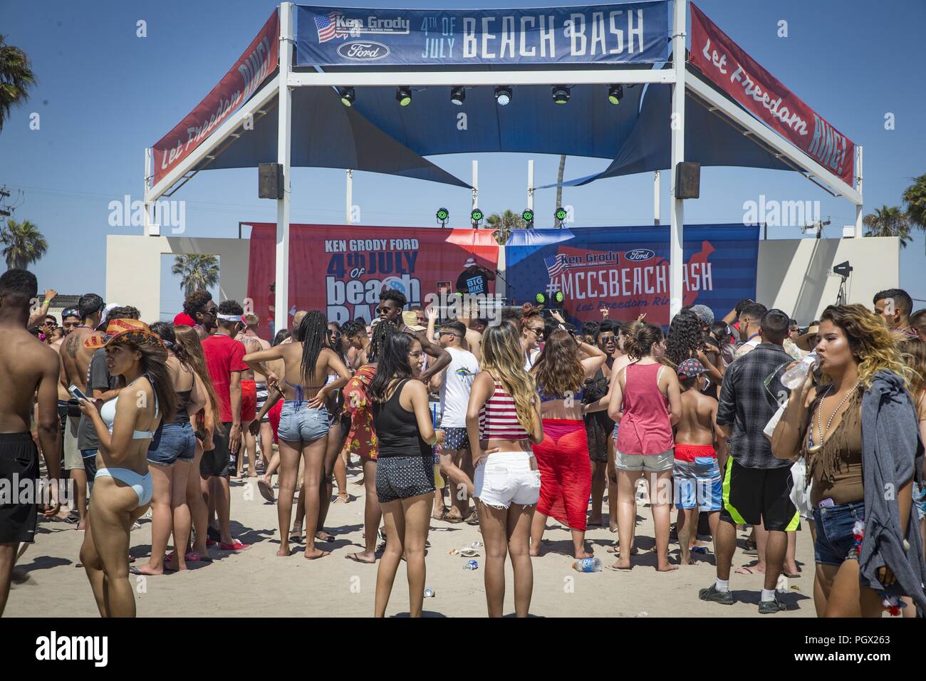Young people gathered in front of the stage during the Fourth of July