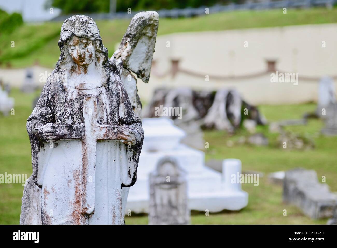 Angel statue in Sumay Cemetery, Guam, July 19, 2018. Image courtesy Petty Officer 3rd Class Amanda Levasseur / U.S. Coast Guard District 14 Hawaii Pacific. () Stock Photo