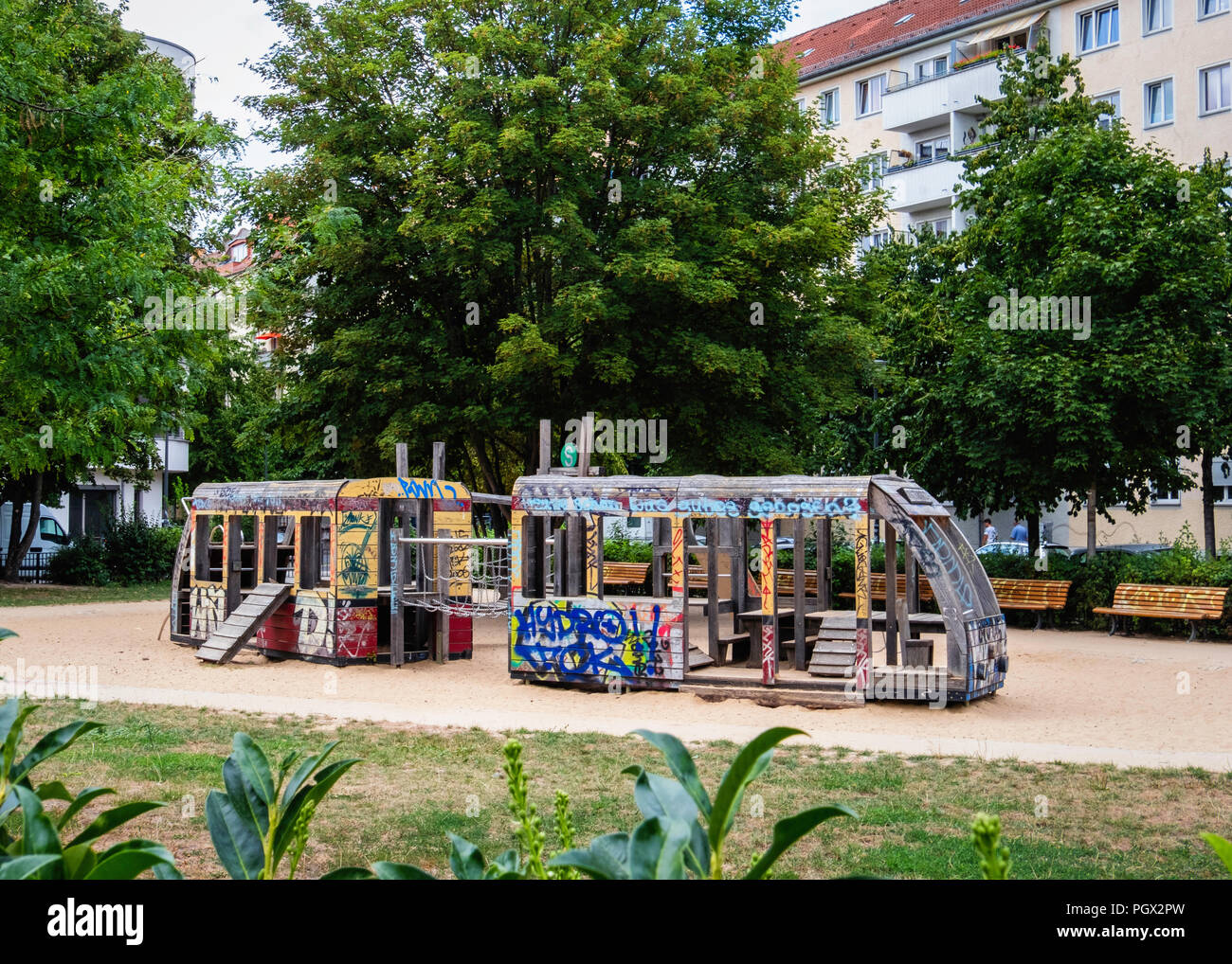 Friedrichshain-Berlin, S-bahn Spielplatz children's playground with wooden train Stock Photo