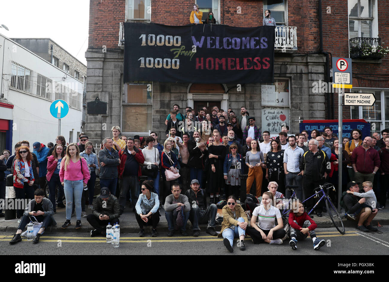 People attend a rally outisde 34 Frederick St North in support of the occupiers of the building in Dublin's city centre following a High Court injunction ordering them to leave by 2pm today. Stock Photo