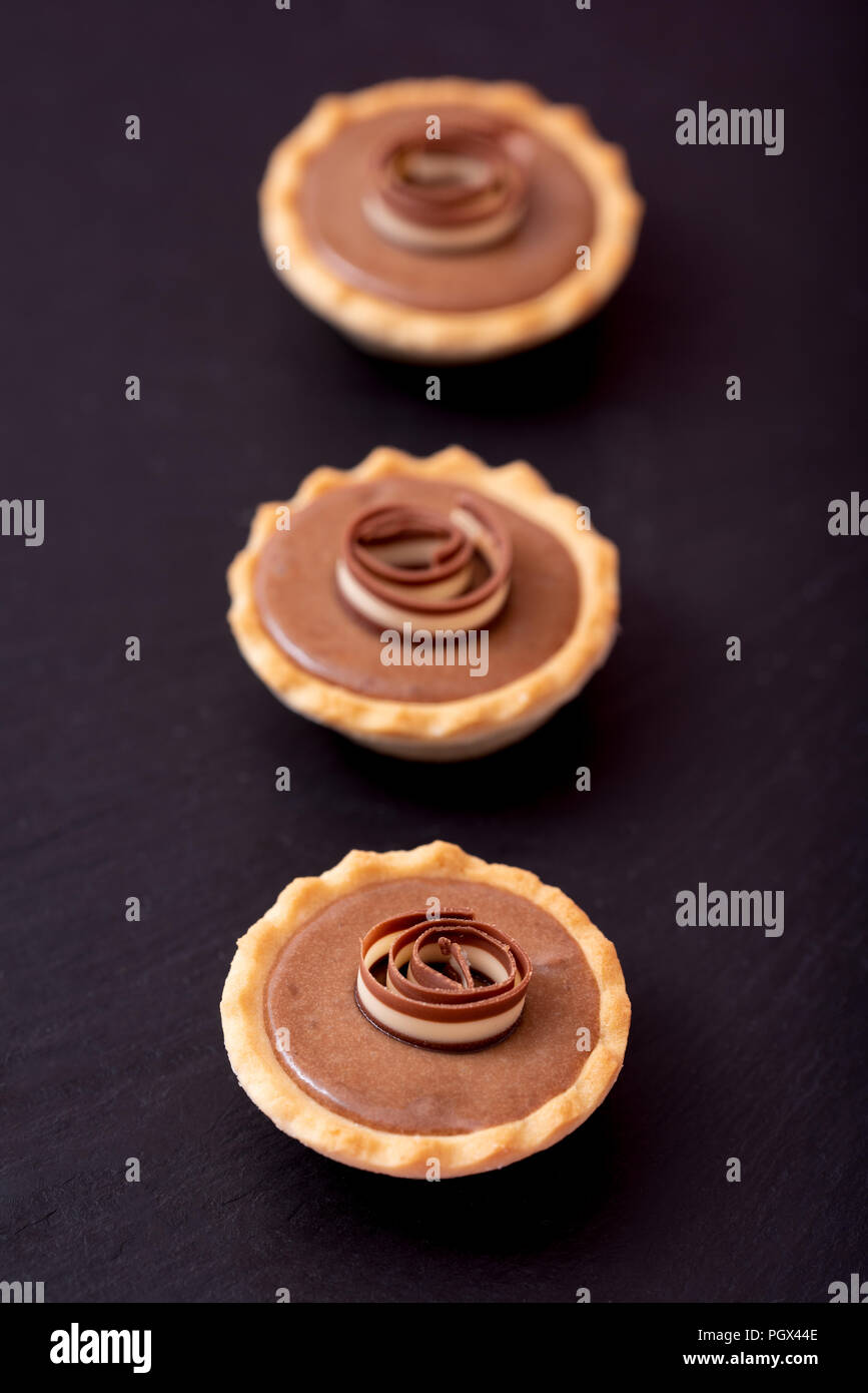 mini-tarts with milk chocolate cream Stock Photo