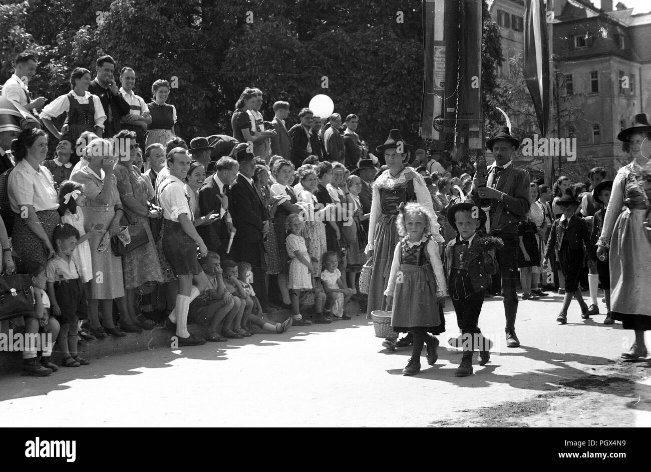 Traditional Austrian festival street parade in the Tyrol Austria 1948 Stock Photo