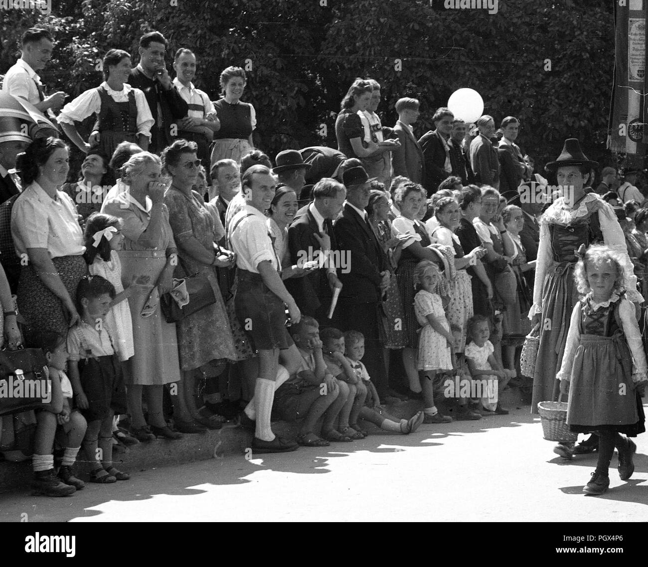 Traditional Austrian festival street parade in the Tyrol Austria 1948 Stock Photo