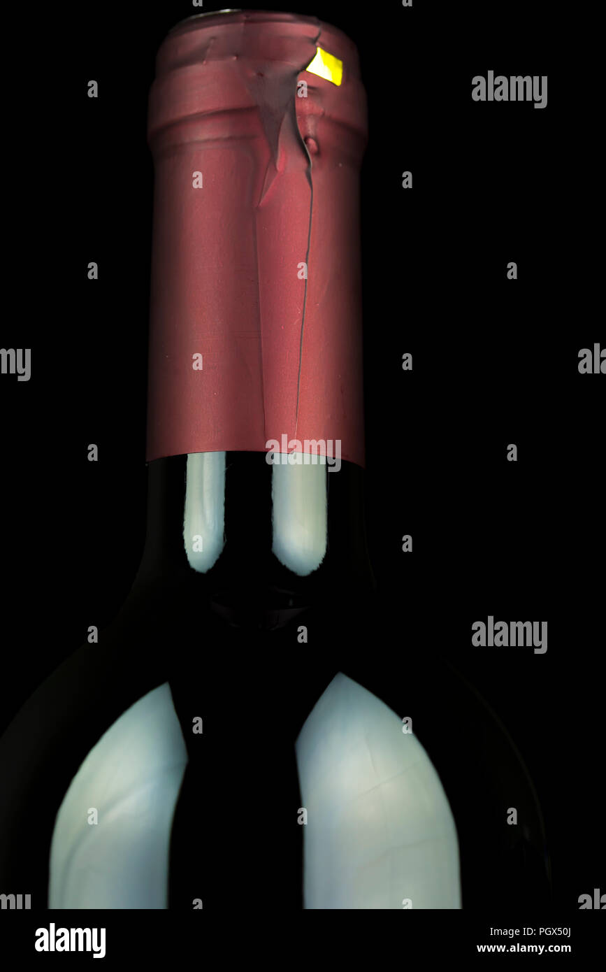 Closeup of wine bottle neck. Over black background Stock Photo Alamy