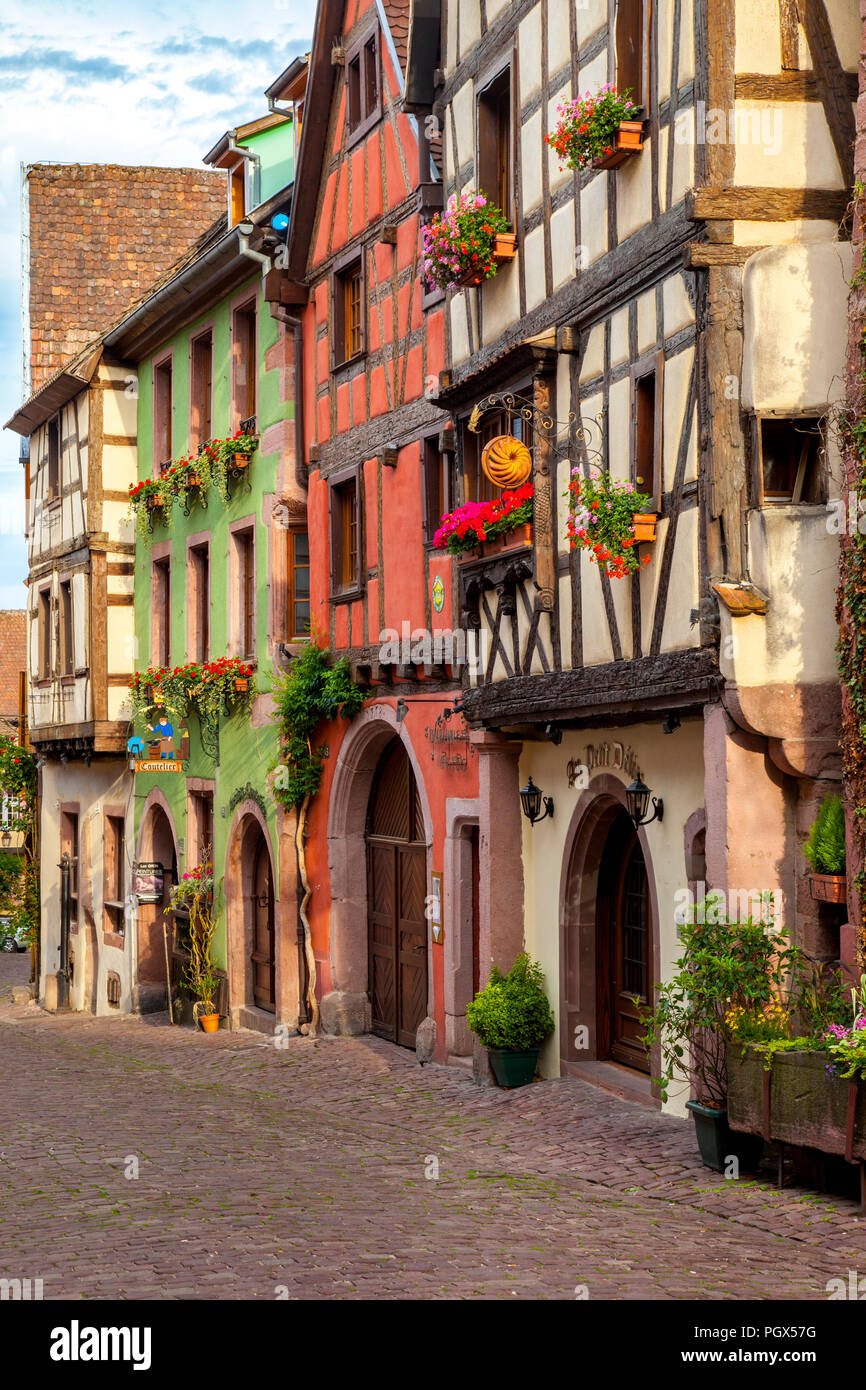 Half-Timbered buildings on Rue du General de Gaulle in Riquewihr - along the Wine Route, Alsace Haut-Rhin France Stock Photo