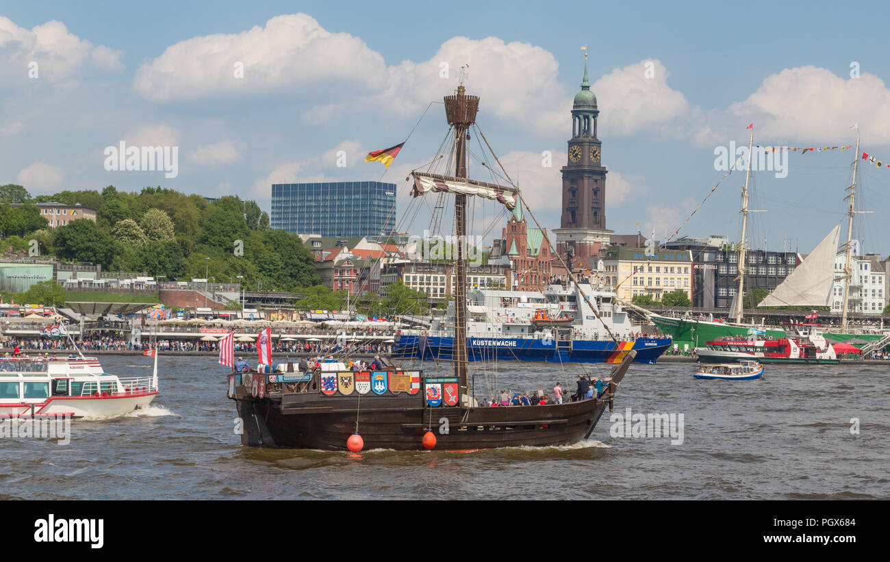 Ships on the river Elbe in front of St. Pauli Piers, Port of Hamburg, behind the church of St. Michael Michel, Hamburg, Germany Stock Photo
