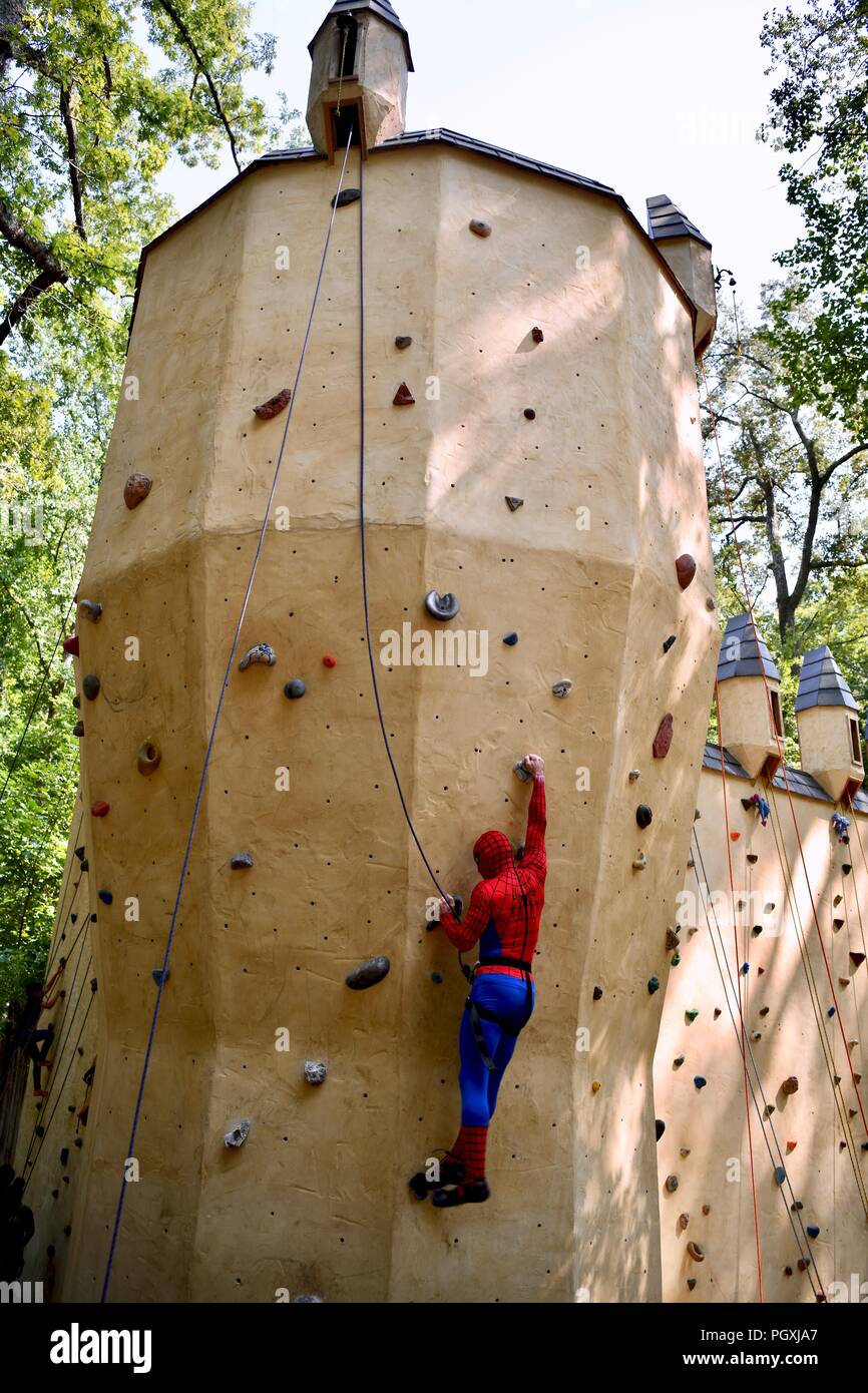 Spiderman on a rock climbing wall at the Renaissance Festival of ...
