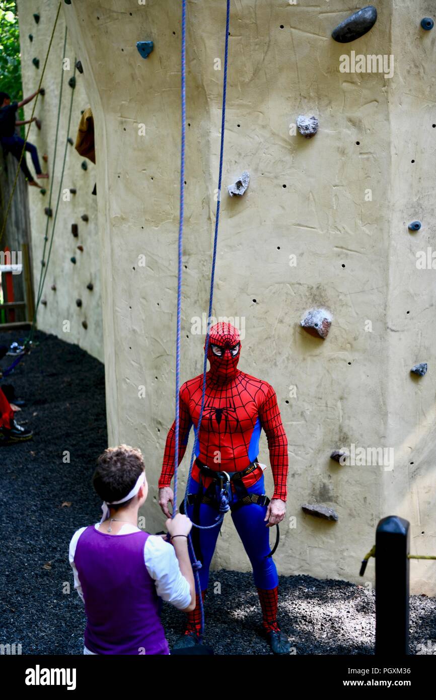 Spiderman on a rock climbing wall at the Renaissance Festival of