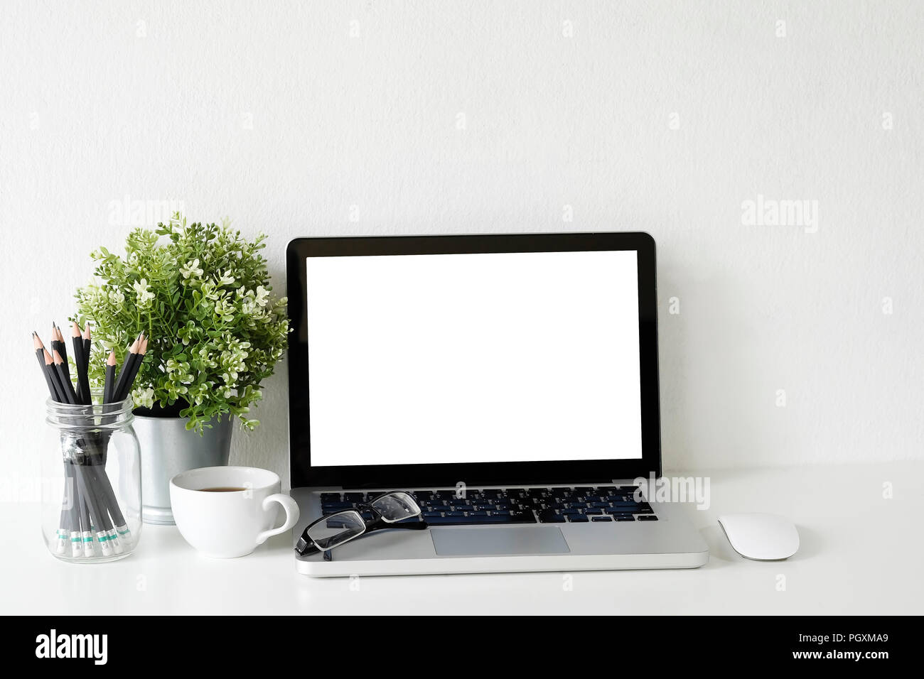 Workspace Laptop Computer Coffee Cup And Plant Decorate On White