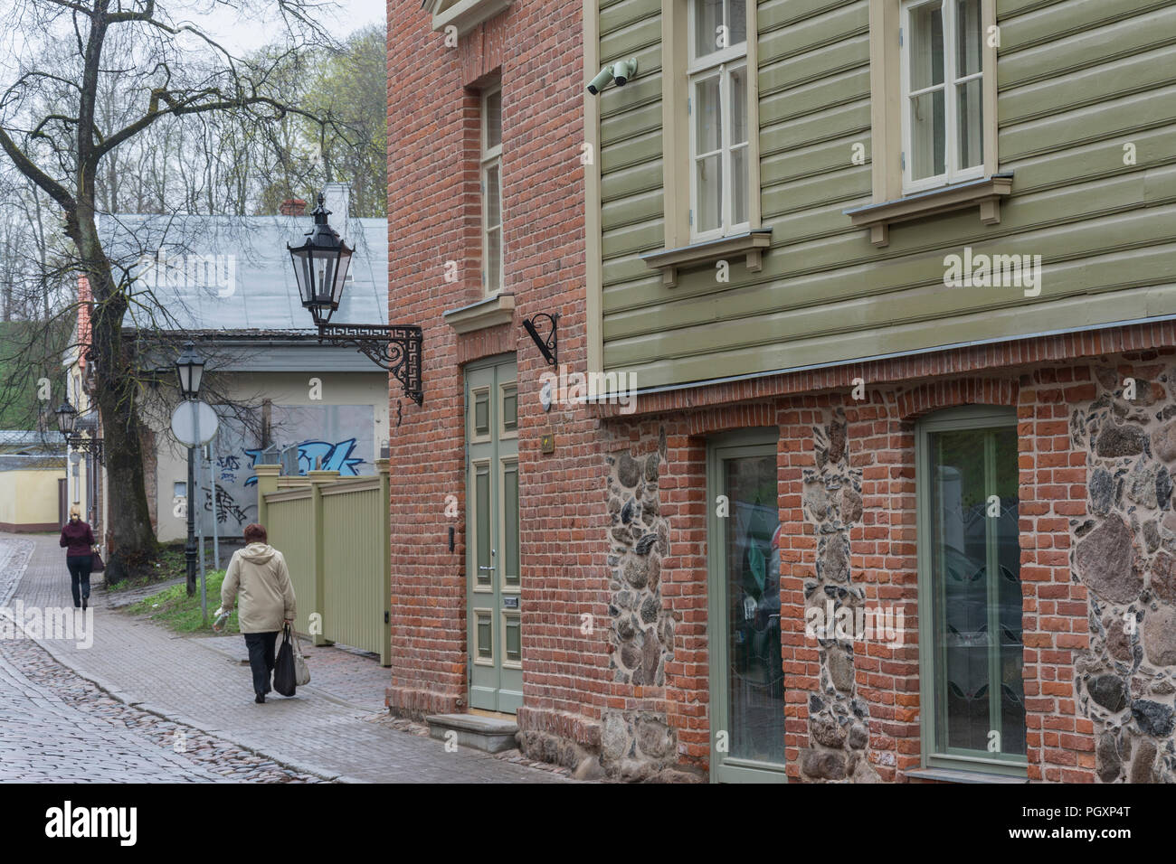 Red brick and green plank house in Tartu Estonia Stock Photo Alamy