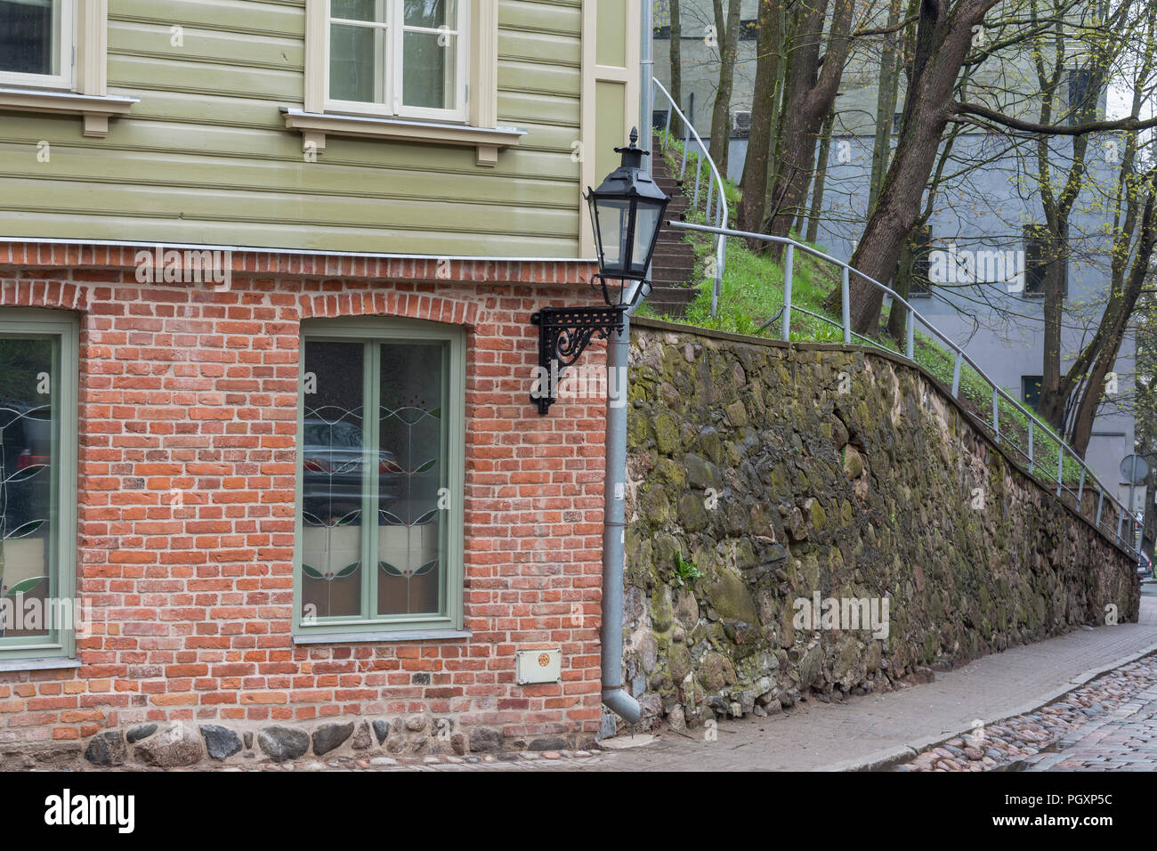Red brick and green plank House in Tartu Estonia Stock Photo Alamy