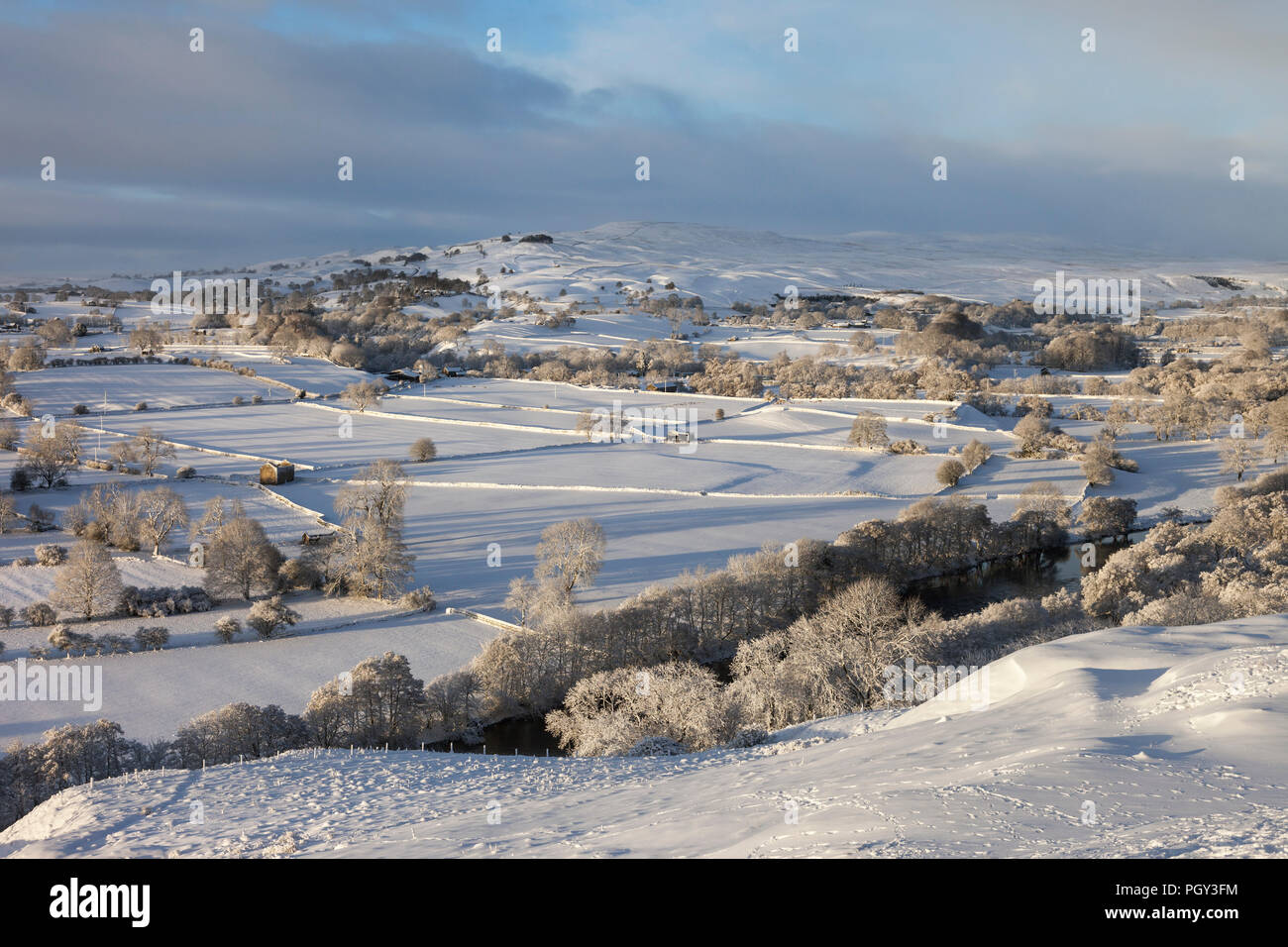 Soft Winter Illuminates the View Across the Tees Valley Towards Harter Fell and Kirkcarrion from Whistle Crag, Middleton-in-Teesdale, County Durham, U Stock Photo