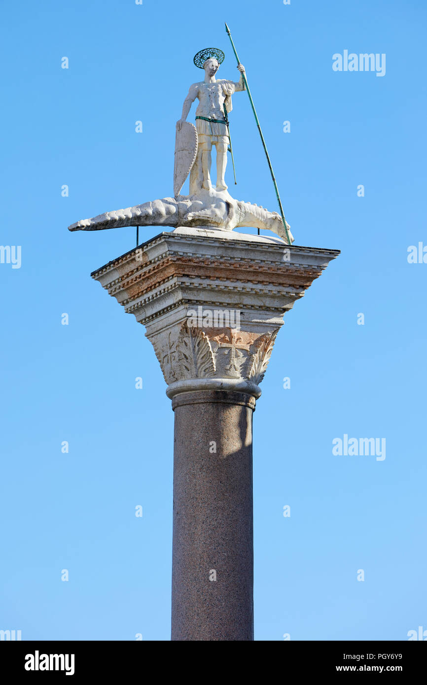 Venice, San Todaro statue on column in sunny day in Italy Stock Photo
