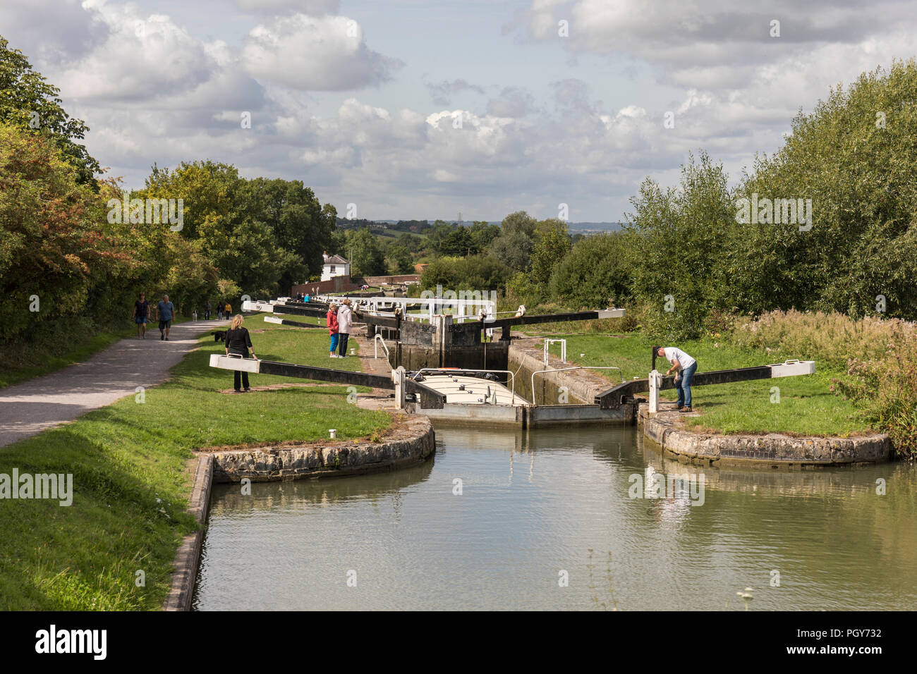 Canal boat at the lock gates on the Kennet and Avon canal, Caen Hill locks, Devizes, Wiltshire, England, UK, Stock Photo