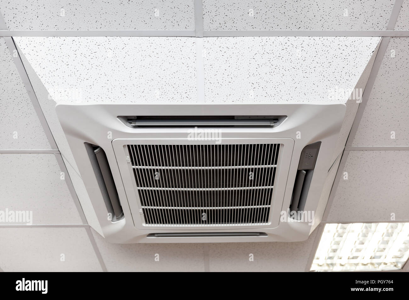 Suspended Tile Ceiling Mounted Big Air Conditioner Close Up