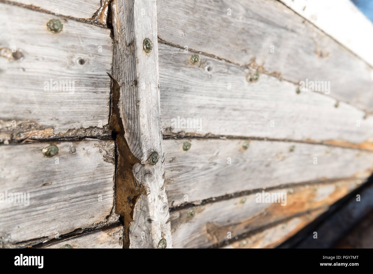 Close up of Interior of Wooden Row Boat with knotted wood and rusty rivets Stock Photo Alamy