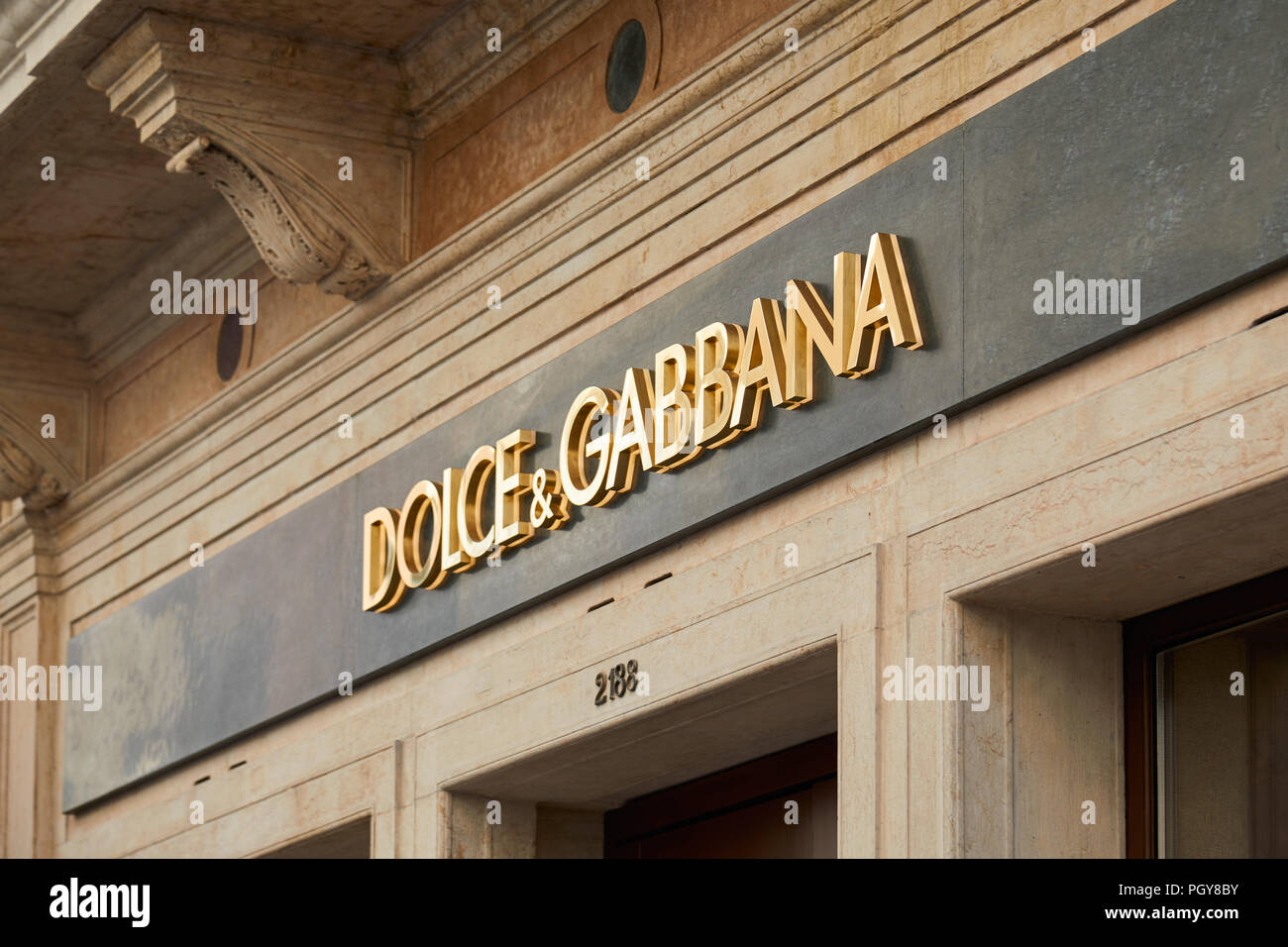 VENICE, ITALY - AUGUST 12, 2017: Dolce and Gabbana golden store sign in Venice, Italy Stock Photo