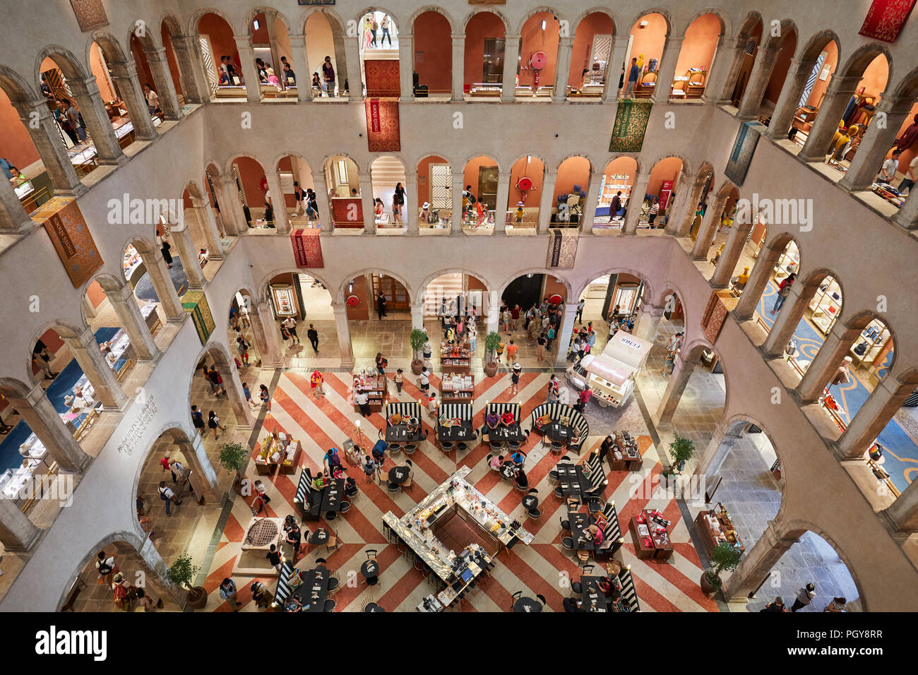 VENICE, ITALY - AUGUST 15, 2017: Fondaco dei Tedeschi, luxury department store interior, high angle view with people and tourists Stock Photo