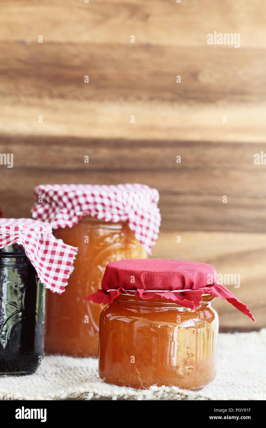 Variety Of Homemade Jams And Preserves With Checkered And Red Cloth Assortment Includes Peach Cantaloupe Orange Marmalade Blueberry And Grape Stock Photo Alamy