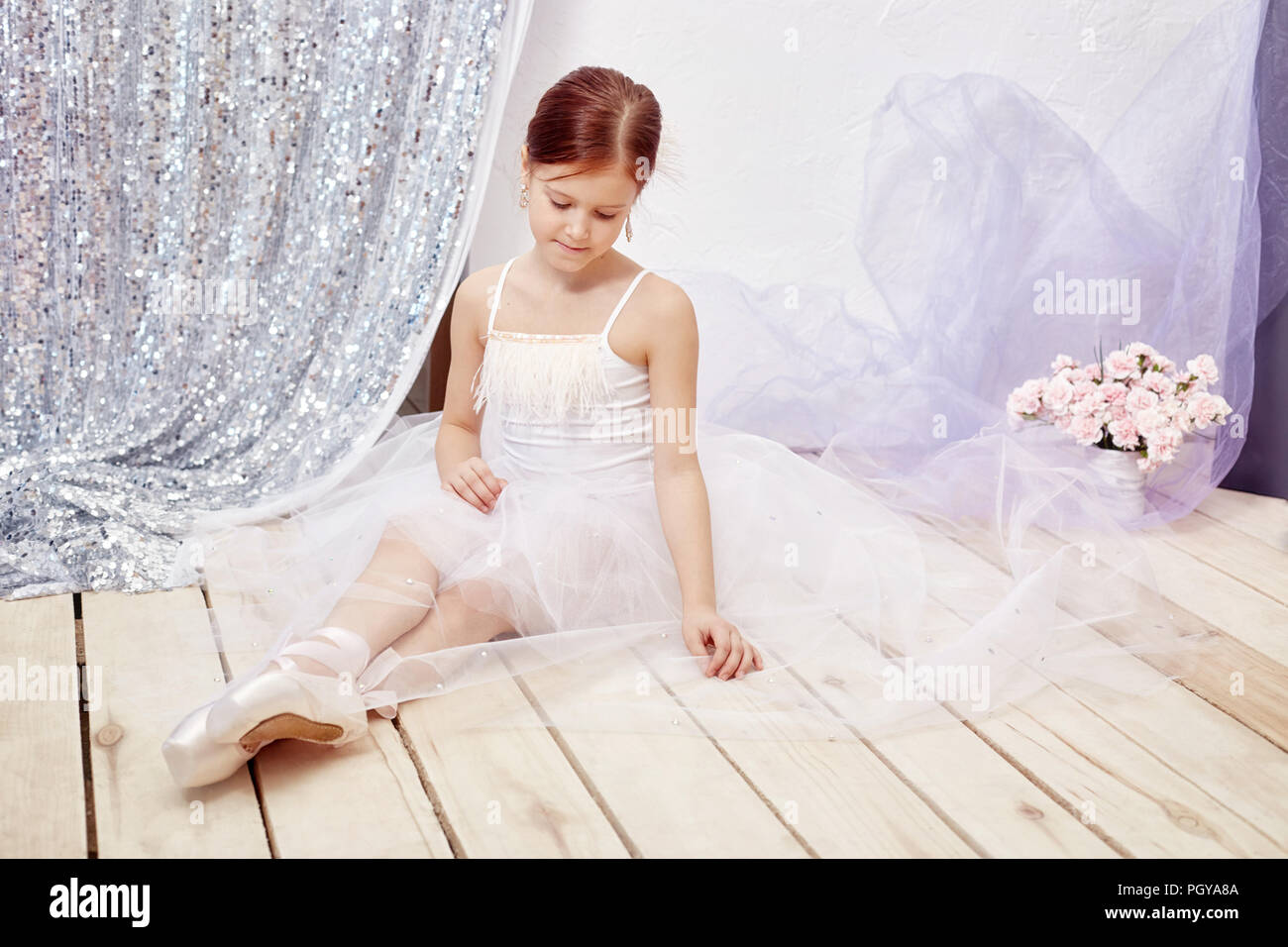 Girl In A White Ball Gown And Shoes Beautiful Red Hair Young