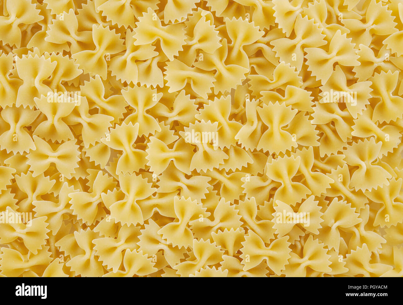 Bow tie pasta background Stock Photo
