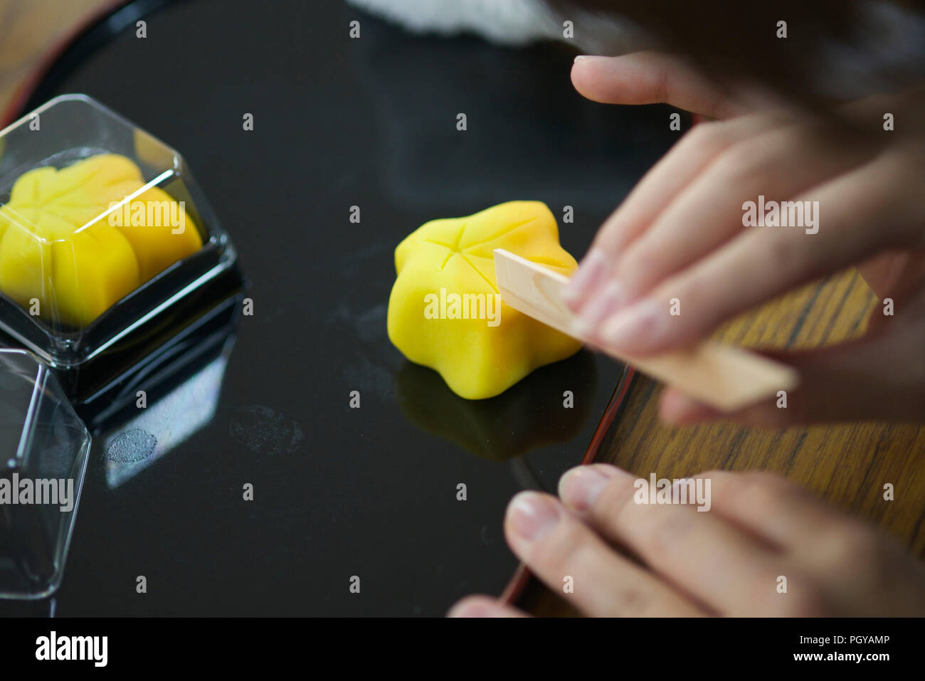 Visitors try their hand at making Kyoto wagashi sweets during a class for members of the public
