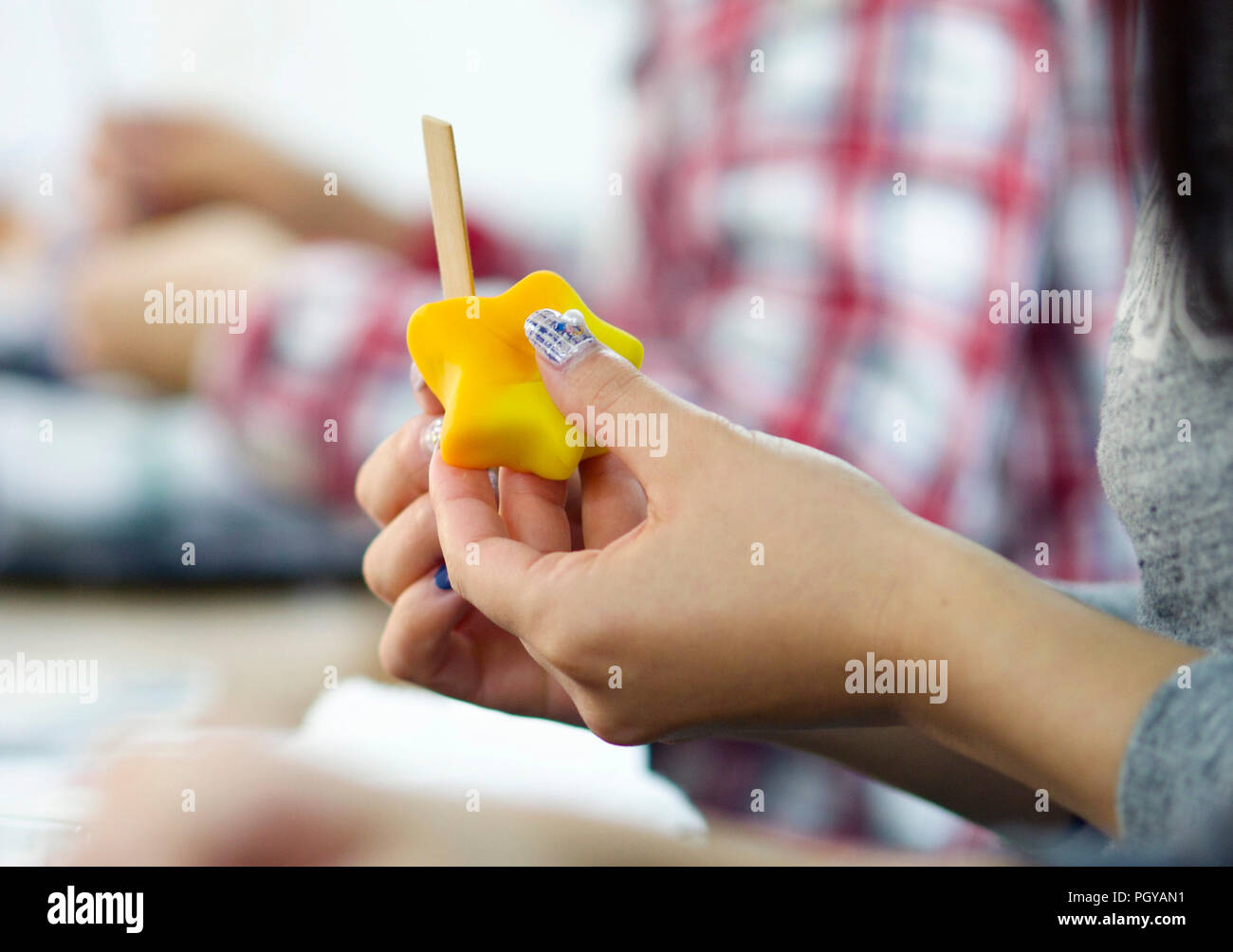 Visitors try their hand at making Kyoto wagashi sweets during a class