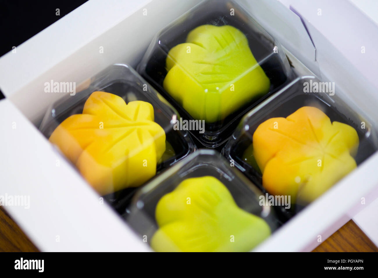 Visitors try their hand at making Kyoto wagashi sweets during a class