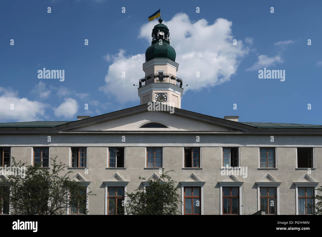 Exterior of the City Hall with a high clock tower built in 1927 in the city of Drohobycz or Drohobych which was once home to a large Jewish community. Ukraine Stock Photo