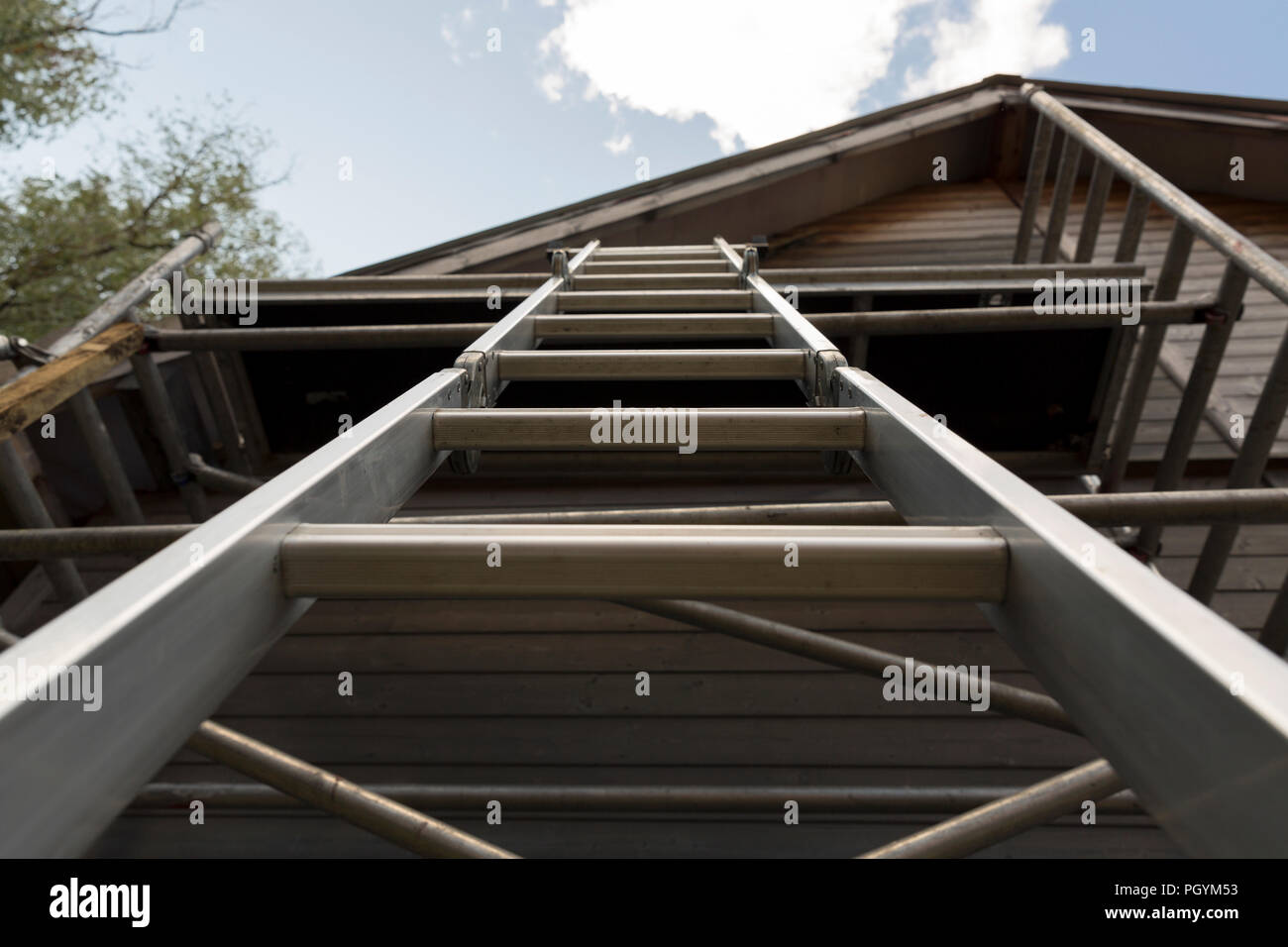 Aluminium ladders on a scaffolding Stock Photo Alamy