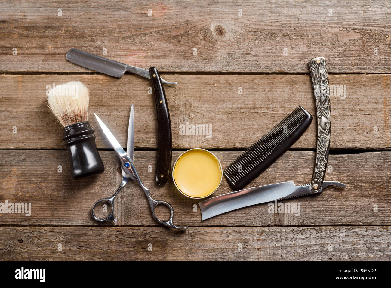 Scissors, wax and comb Stock Photo Alamy