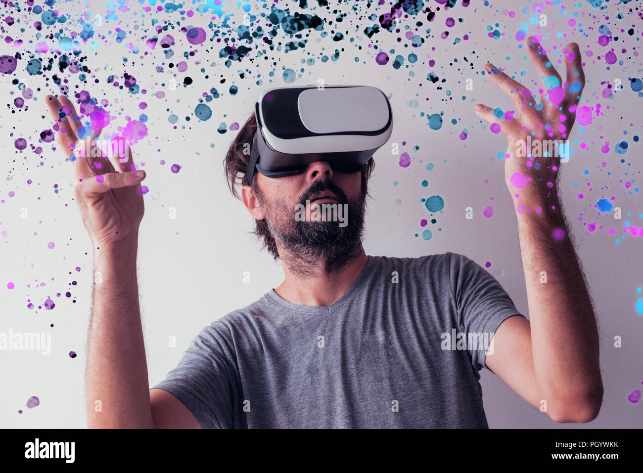Virtual reality immersion, man wearing VR headset Stock Photo