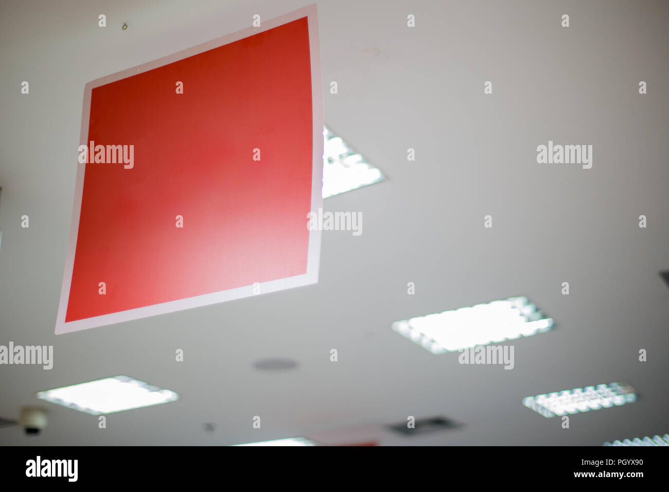 Red sign on a shop. Space for text. Sale in a clothing store. Copy space. Stock Photo