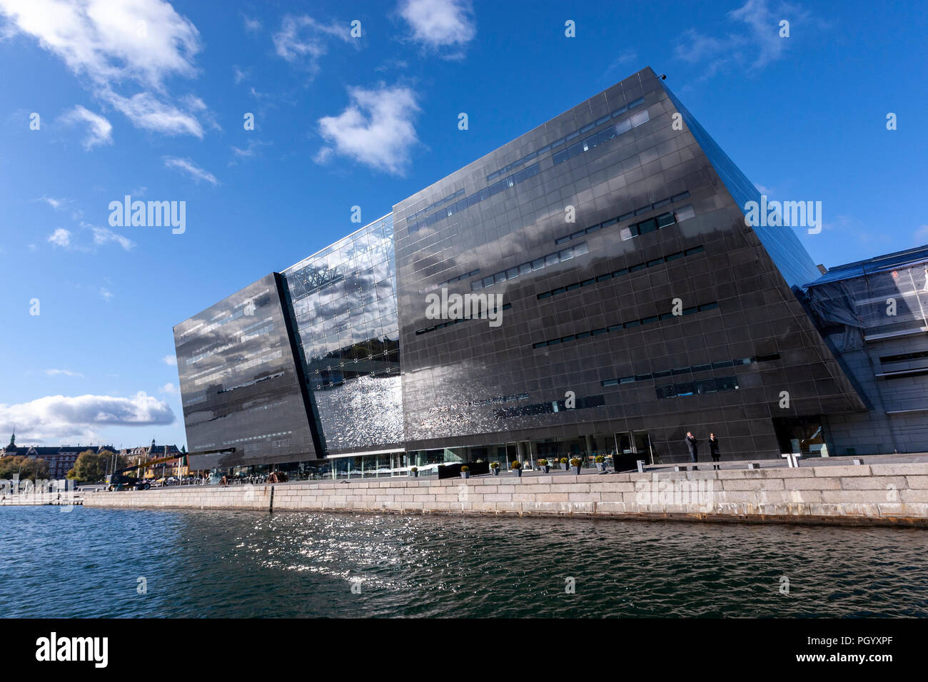 Reflection in the facade of the Royal Danish Library, The Black Diamond library, Designed by architects Schmidt Hammer Lassen, Copenhagen, Denmark. Stock Photo