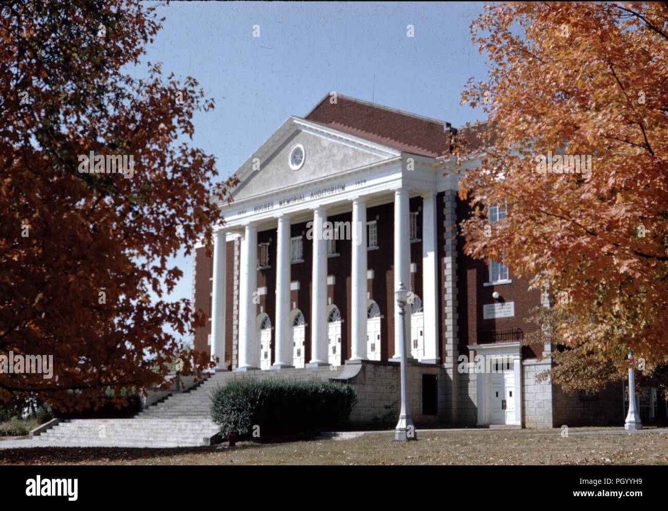 Side view with autumn trees of the Hughes Memorial Auditorium at Asbury