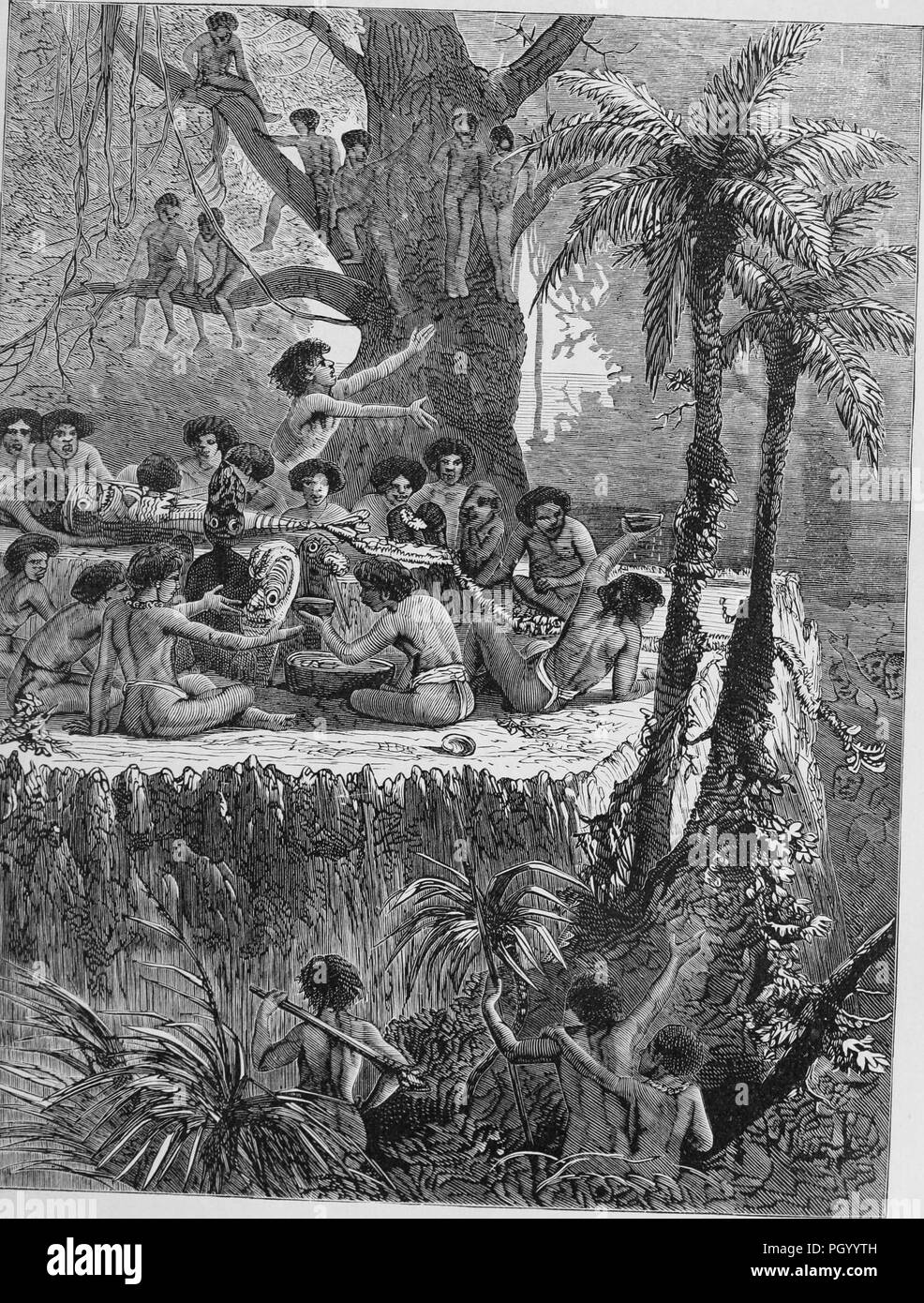 Black and white vintage print, depicting a group of male Society Islanders, wearing loincloths, and seated on a low cliff with a large tree in the background, engaged in a ceremony to dress or beautify wooden effigies of Gods, one of which may be Oro, the God of War, published in John George Wood's volume 'The uncivilized races of men in all countries of the world, being a comprehensive account of their manners and customs, and of their physical, social, mental, moral and religious characteristics', 1877. Courtesy Internet Archive. () Stock Photo