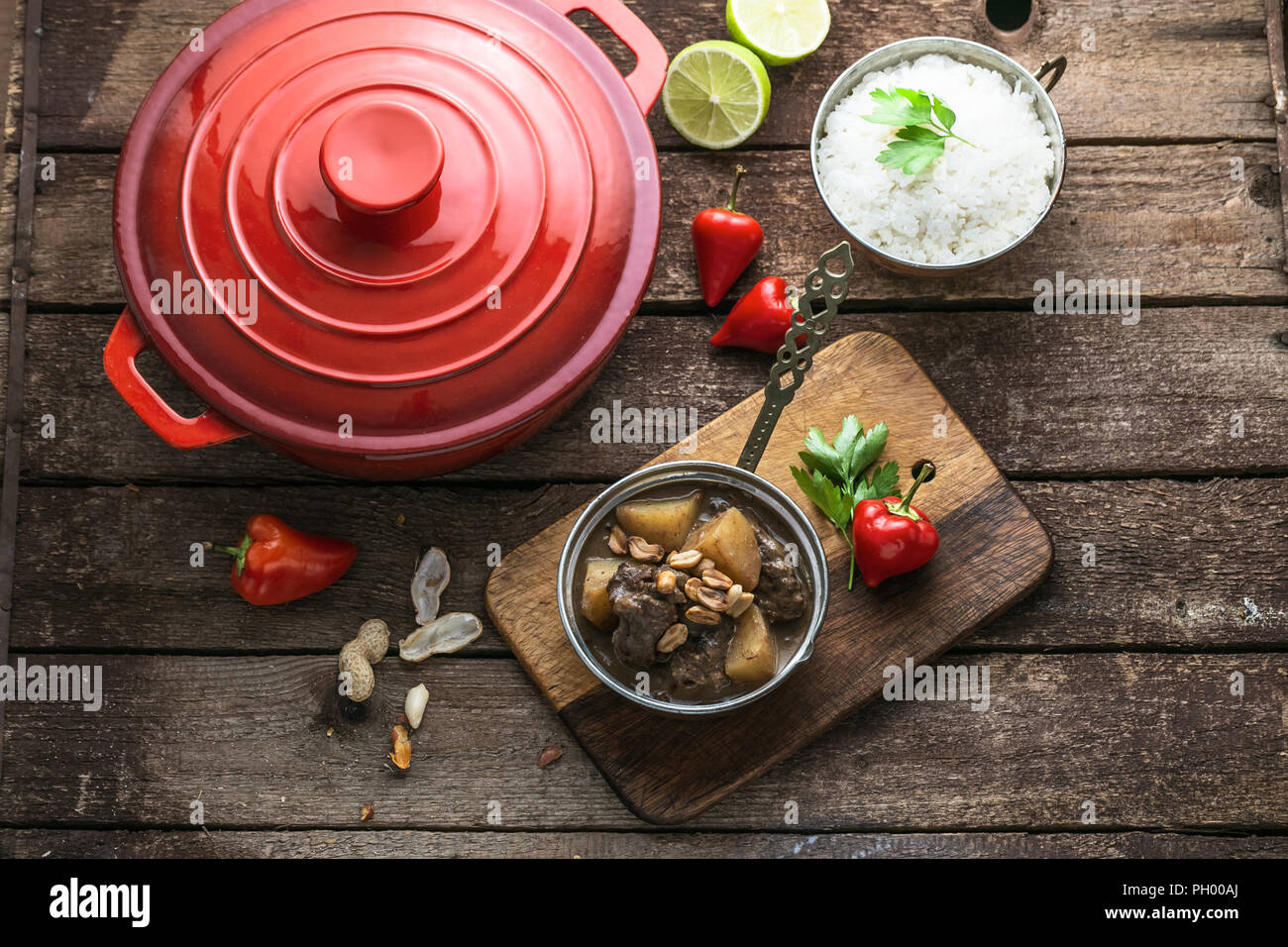 Massaman beef curry on wood background.coconut milk curry. Stock Photo