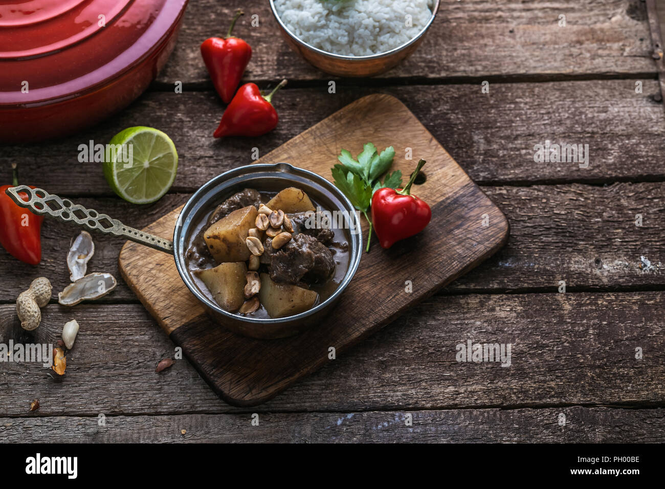 Thai massaman curry with beef and peanuts on the table Stock Photo