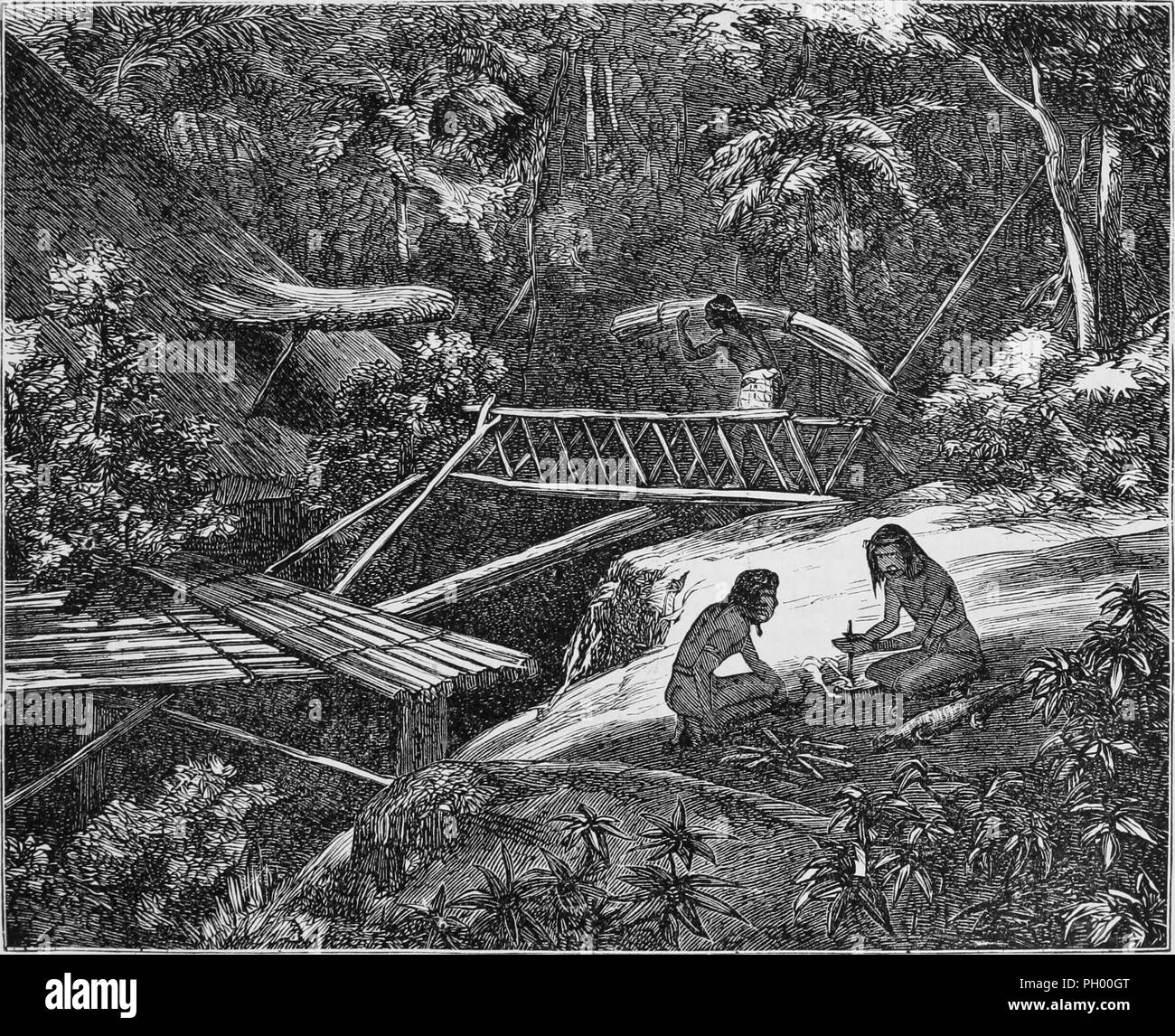 Black and white vintage print, depicting a Dayak longhouse being built, with a Dayak man carrying thatching over a bridge to the roof in the background, a long external platform at left, and two Dayak men sitting cross-legged in the foreground, one rubbing a stick on flat piece of wood to make a fire, located in Borneo, published in John George Wood's volume 'The uncivilized races of men in all countries of the world, being a comprehensive account of their manners and customs, and of their physical, social, mental, moral and religious characteristics', 1877. Courtesy Internet Archive. () Stock Photo
