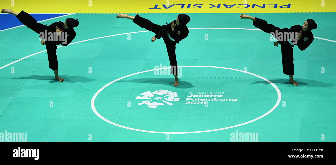 Jakarta. 29th Aug, 2018. Team Indonesia compete during women's team final of Pencak Silat at the 18th Asian Games in Jakarta, Indonesia on Aug. 29, 2018. Credit: Pan Yulong/Xinhua/Alamy Live News Stock Photo