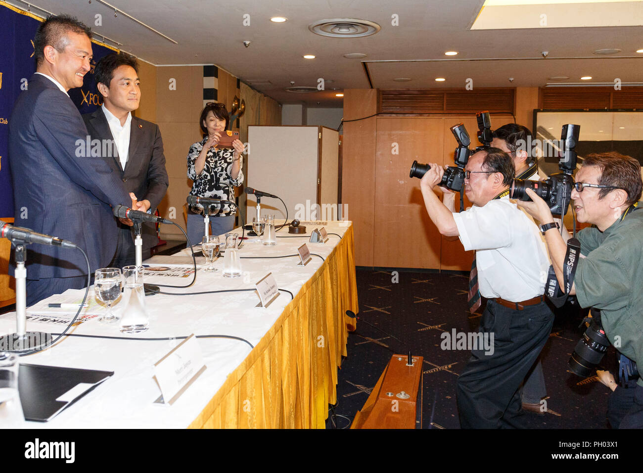 Tokyo, Japan. 29th Aug 2018. (L to R) Japanese politicians Keisuke Tsumura and Yuichiro Tamaki, both candidates for their party's leadership, pose for the cameras during a news conference at the Foreign Correspondents' Club of Japan on August 29, 2018, Tokyo, Japan. Tamaki and Tsumura answered questions about the coming leadership election for the Democratic Party For the People, which is set for September 4. Credit: Rodrigo Reyes Marin/AFLO/Alamy Live News Stock Photo