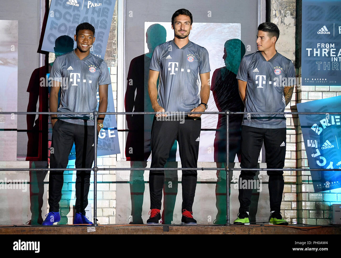 Berlin, Germany. 29th Aug, 2018. 29.08.2018, Berlin: Soccer pros David  Alaba (l-r), Mats Hummels and James Rodriguez wear the new steel-grey  jerseys of FC Bayern Munich for the new Champions League season
