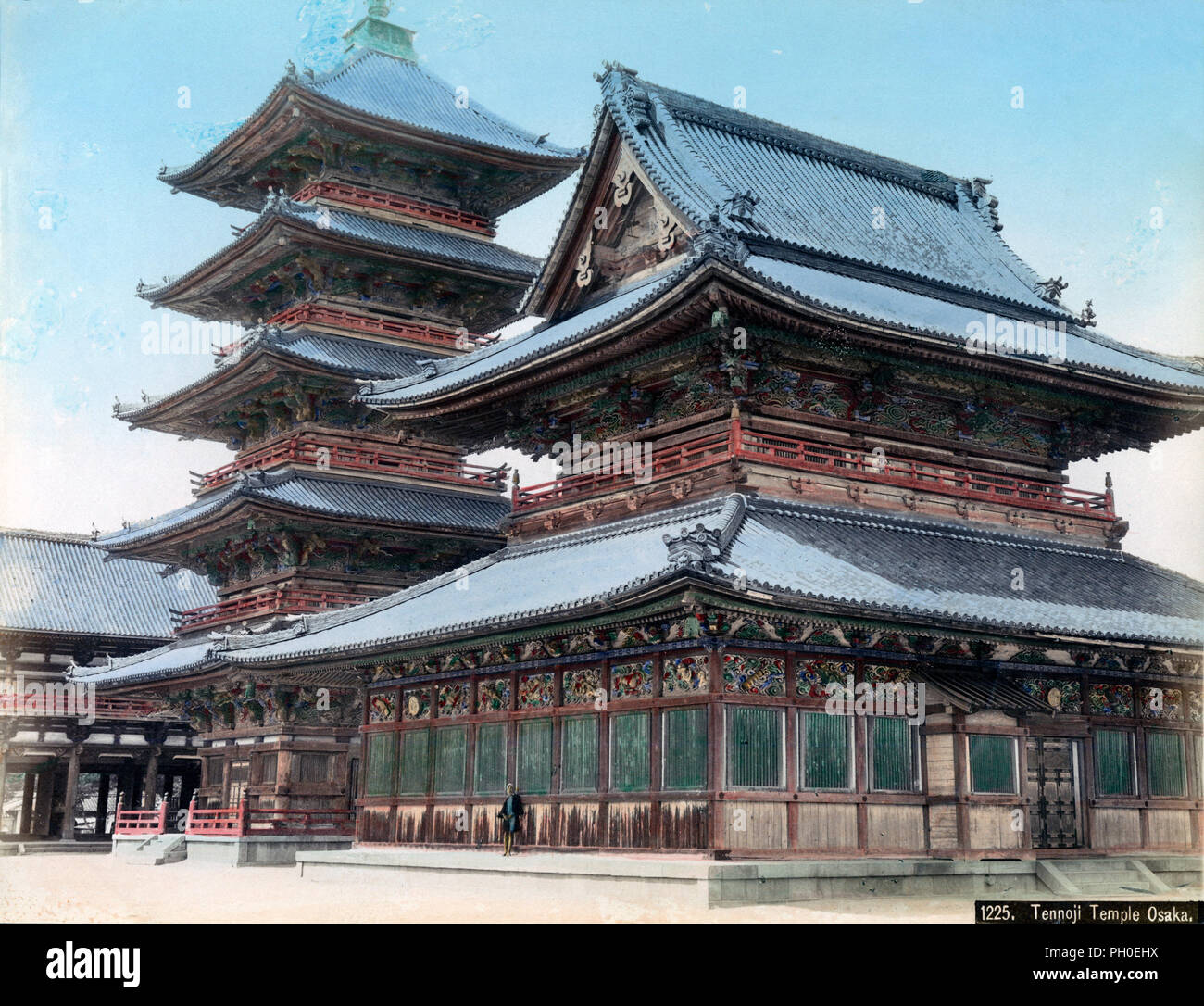 [ 1880s Japan - Shitennoji Temple in Osaka ] —   The Kondo (Golden Hall) and the five-story pagoda at Shitennoji Temple in Osaka. Both are based in the center of the temple buildings. Shitennoji Temple was founded by Prince Shotoku (Shotoku Taishi, 574-622) in 593 during Japan’s first wave of temple construction. The Kondo and the pagoda, were completely destroyed by US firebombs in March 1945. In the early 1960s, they were rebuilt in concrete.  19th century vintage albumen photograph. Stock Photo