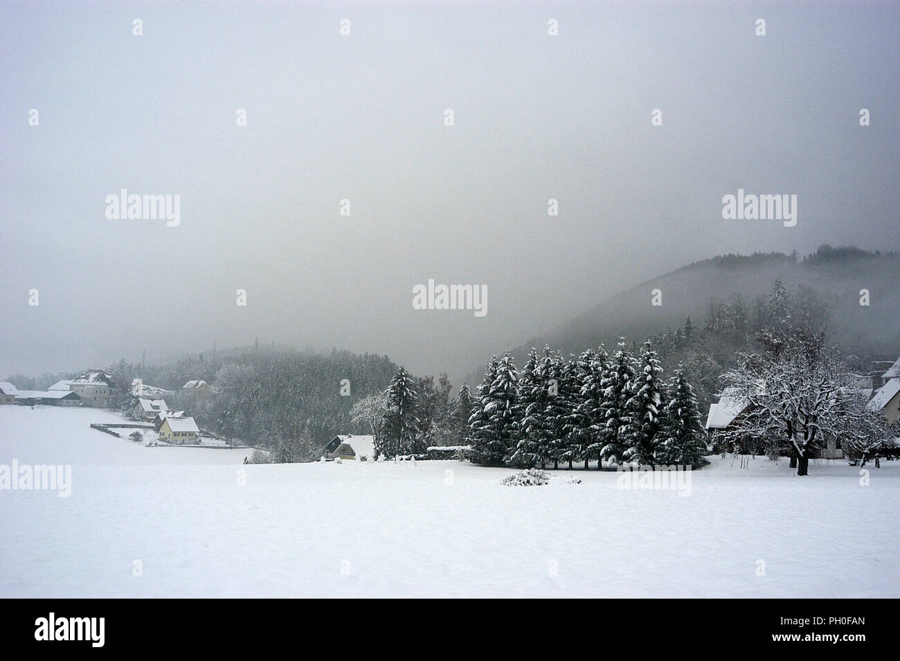 A snow scene in Thal, the home village of Graz's famous son, Arnold Schwarzennegger in Austria Stock Photo