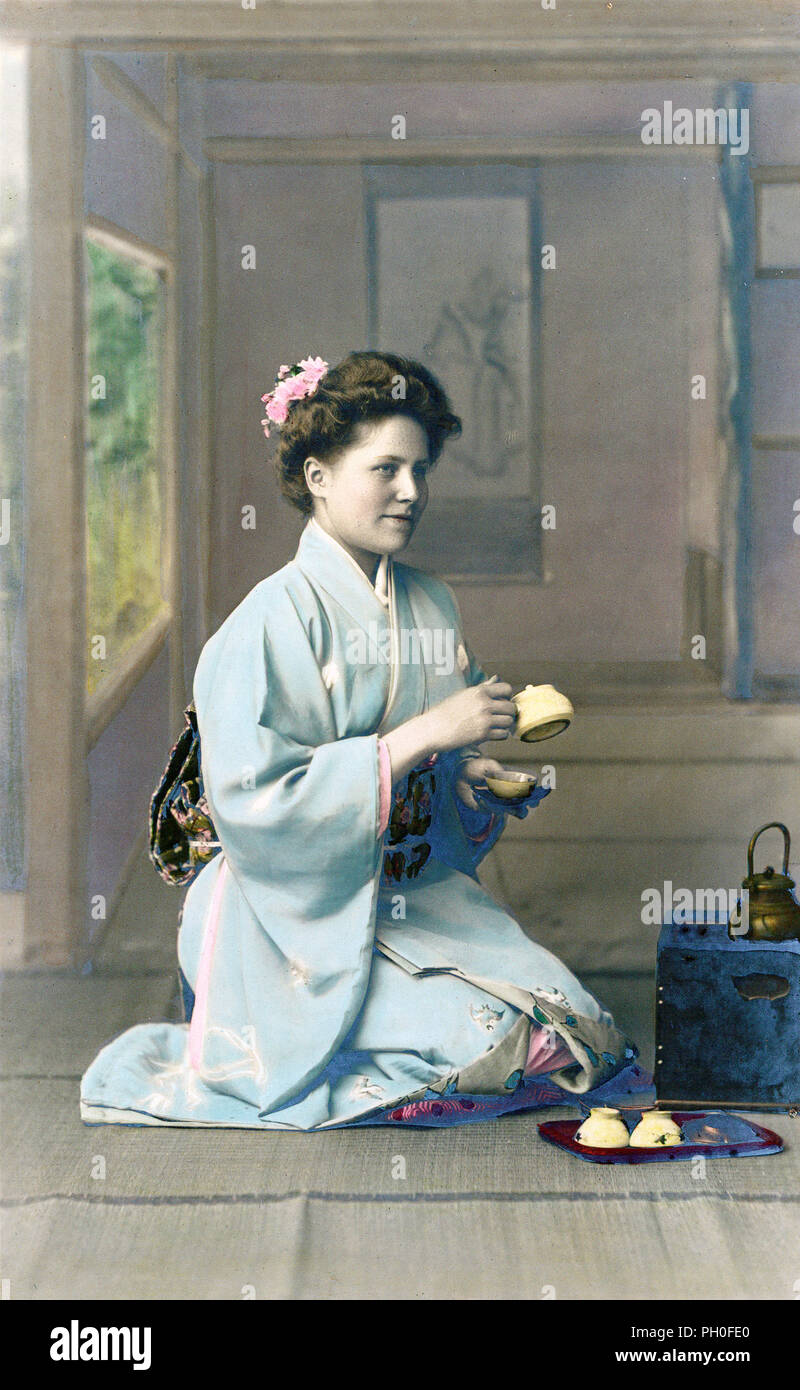 [ 1880s Japan - Western Woman in Kimono ] —   Western woman posing in Japanese kimono. During the late 1800s and early 1900s, it was very popular for Westerners to have themselves photographed in Japanese clothing and settings.  19th century vintage albumen photograph. Stock Photo