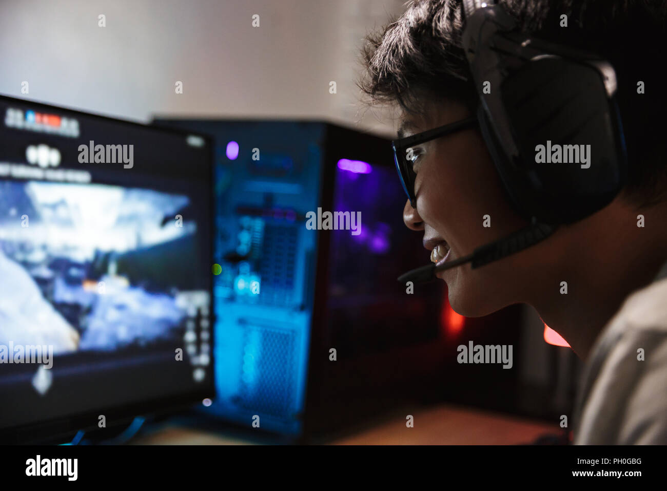 Photo Closeup Of Joyful Teen Gamer Boy Playing Video Games