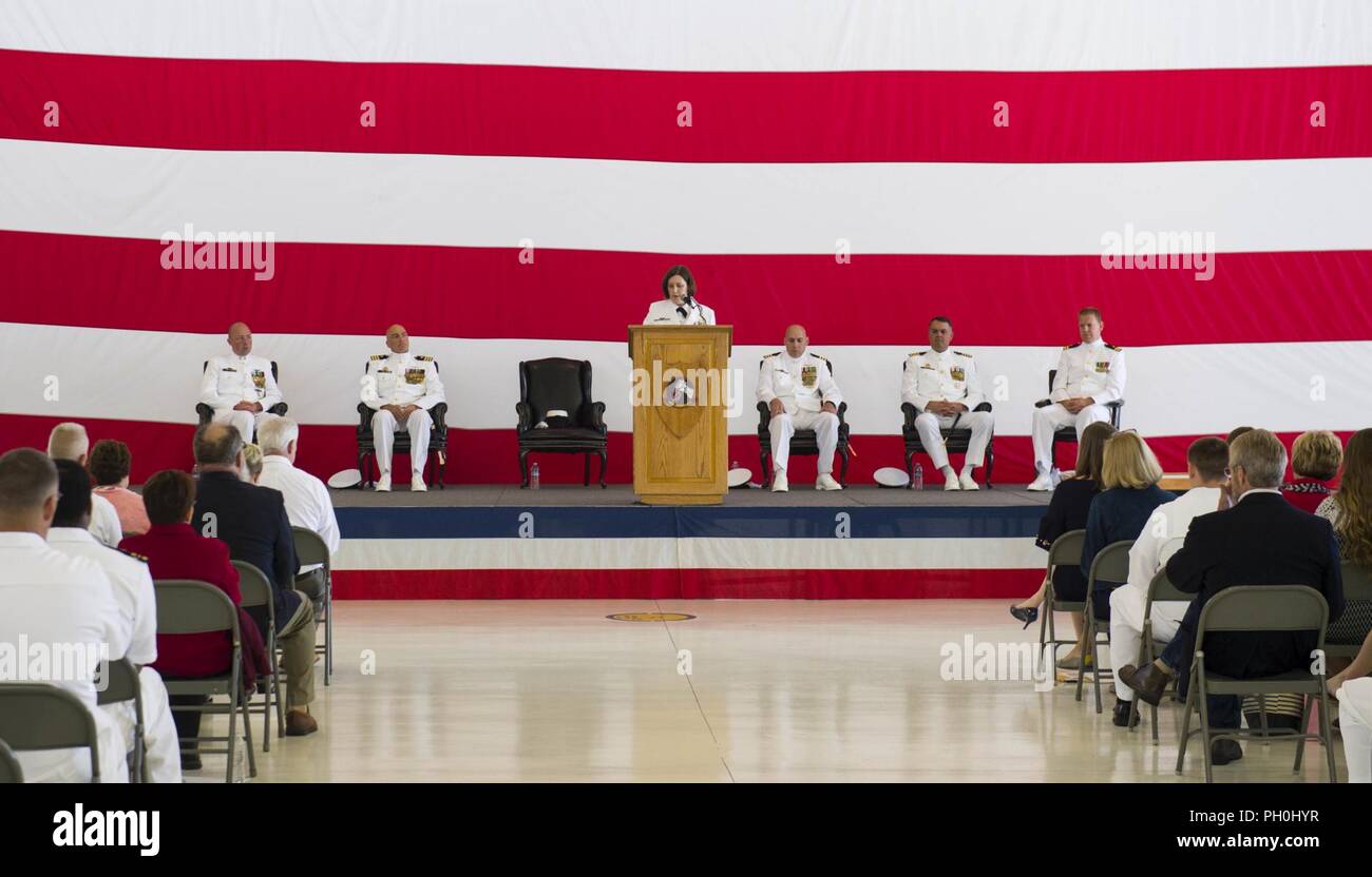 OAK HARBOR, Wash. (June 14, 2018) Deputy Commodore, Patrol and Reconnaissance Wing Ten (CPRW-10), Capt. Erin P. Osborne speaks as the guest of honor during the change of command ceremony for Patrol Squadron (VP-46) at Naval Air Station (NAS) Whidbey Island. During the ceremony, Cmdr. Michael D. Bishop relieved Cmdr. Derrick W. Eastman as commanding officer of the 'Grey Knights' of VP-46. Stock Photo