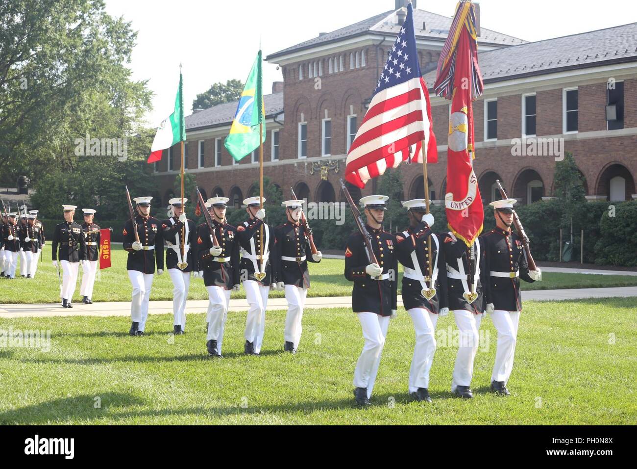 Marines With The U S Marine Corps Color Guard March Across